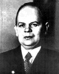 Ackermann with suit and tie